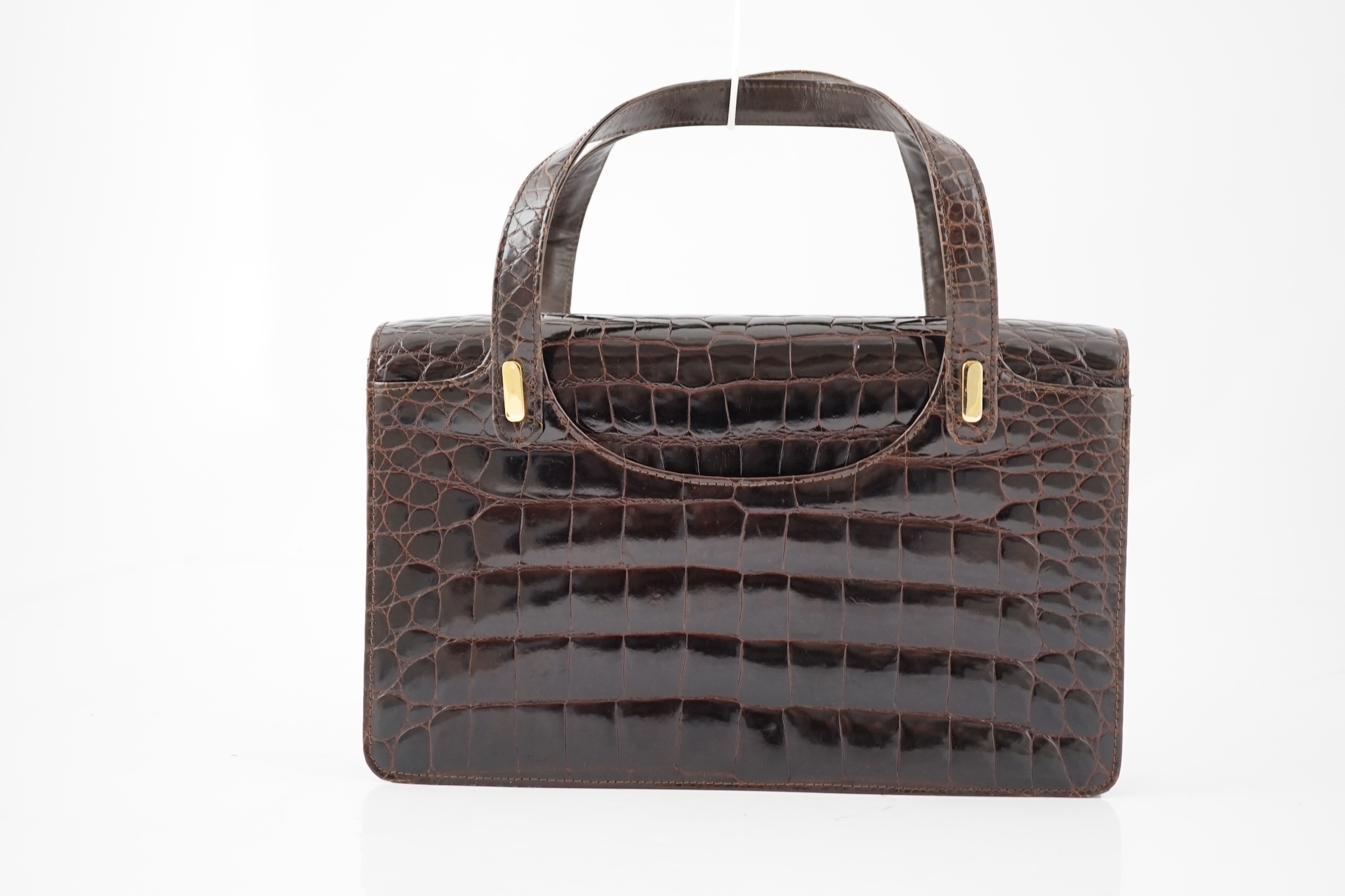 A lady's vintage brown crocodile handbag height 20cm, height to handles 33cm, width 32cm, depth 6cm